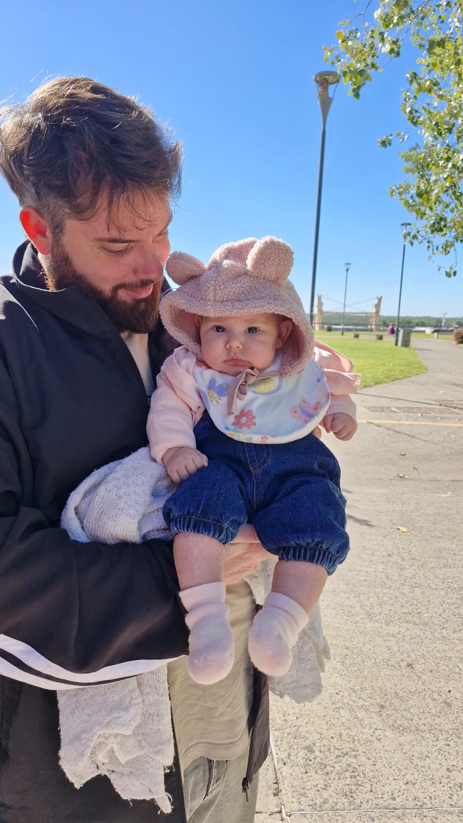Facundo holding his daughter